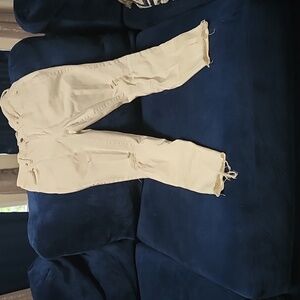Distressed White Midrise skinny jeans size 8, inseam 29.